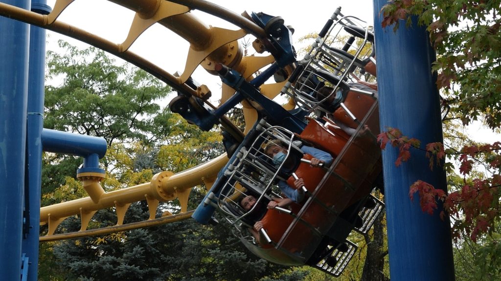 Guests with masks riding Time Warp