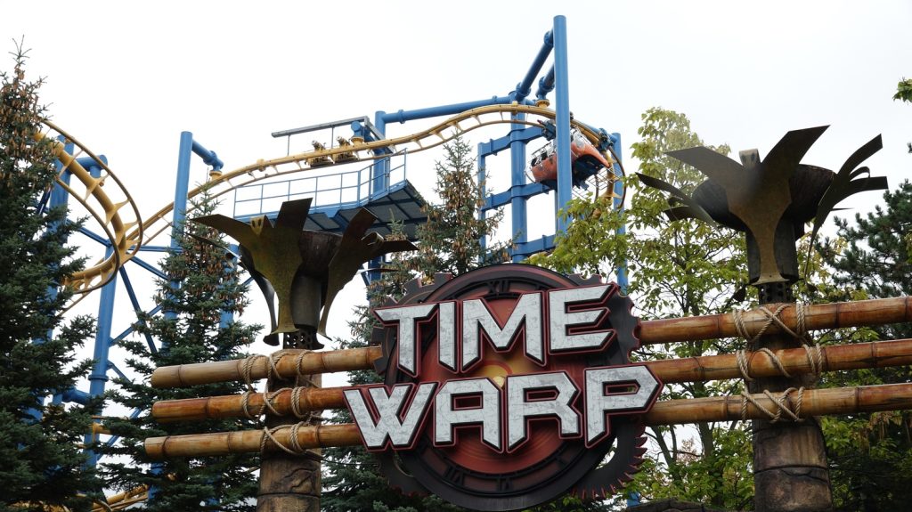 Time Warp entrance sign with the spiral lift in the background.