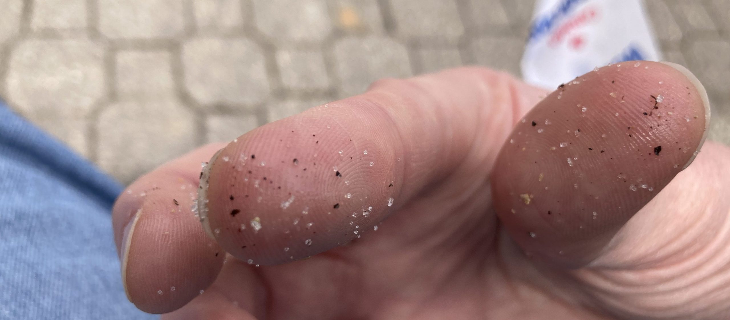 Salt on fingers.