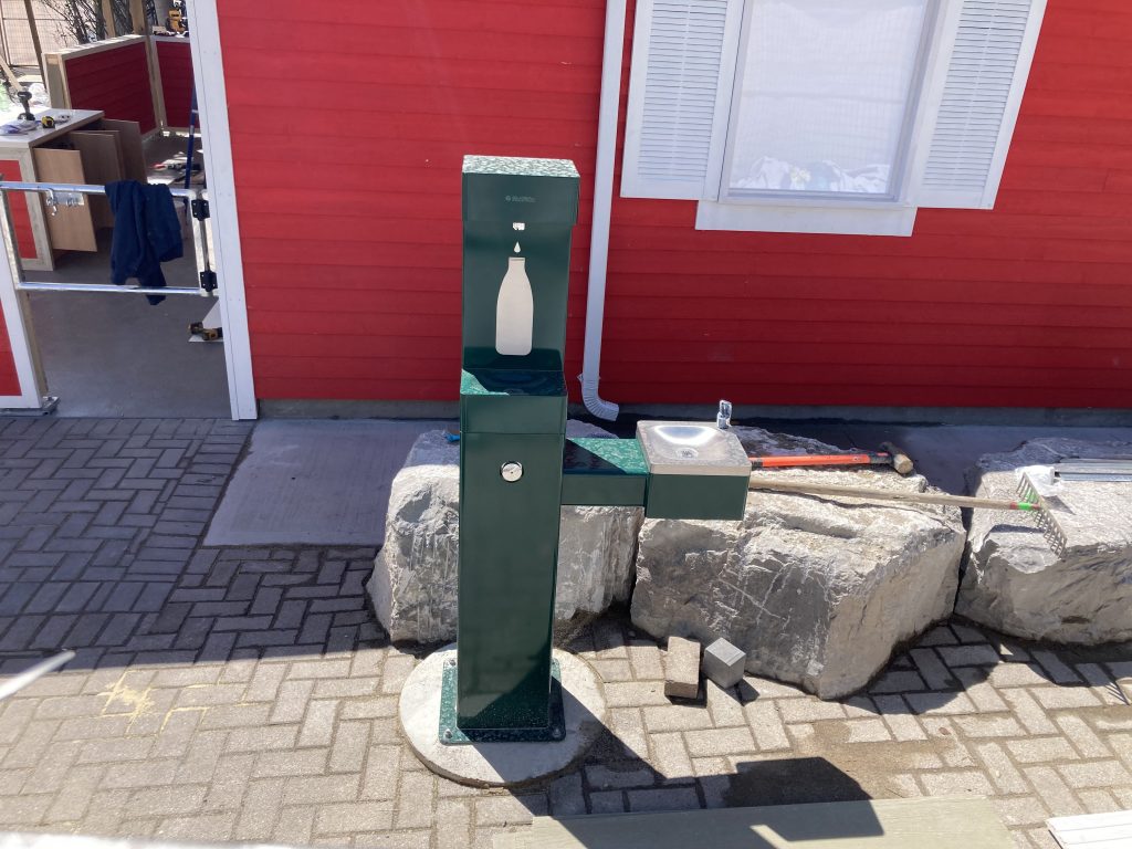 Water bottle refill station and drinking fountain.