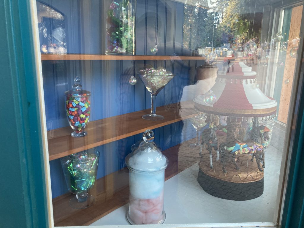 Miniature carrousel in Sweet Spot's window.