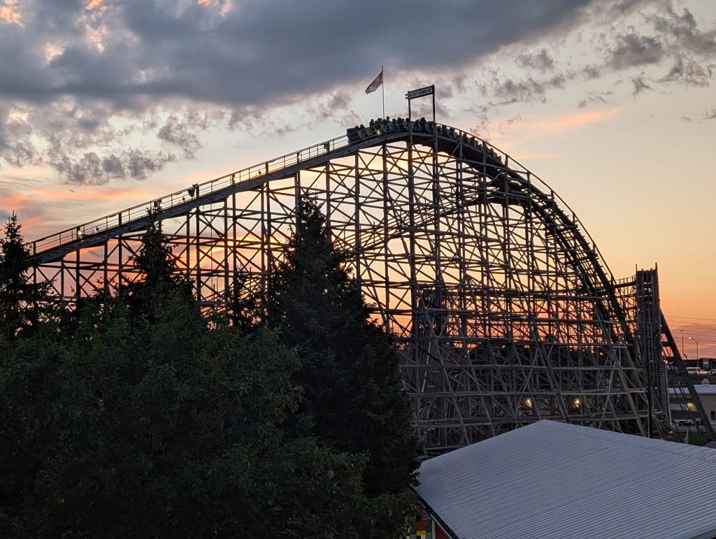 Wilde Beast cresting the lift hill at sunset.