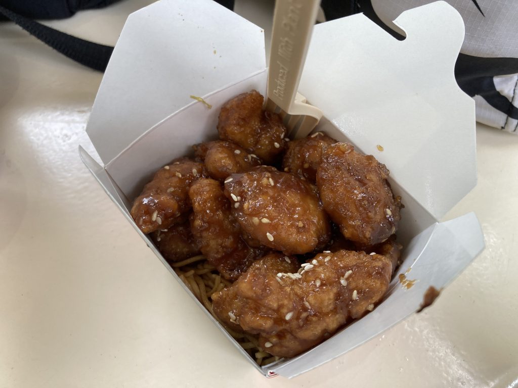 Honey garlic chicken with lo mein noodles.