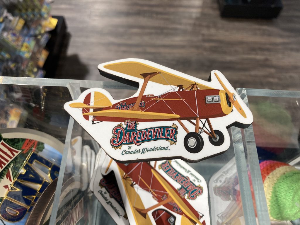 A magnet for The DareDeviler, featuring the eponymous plane.