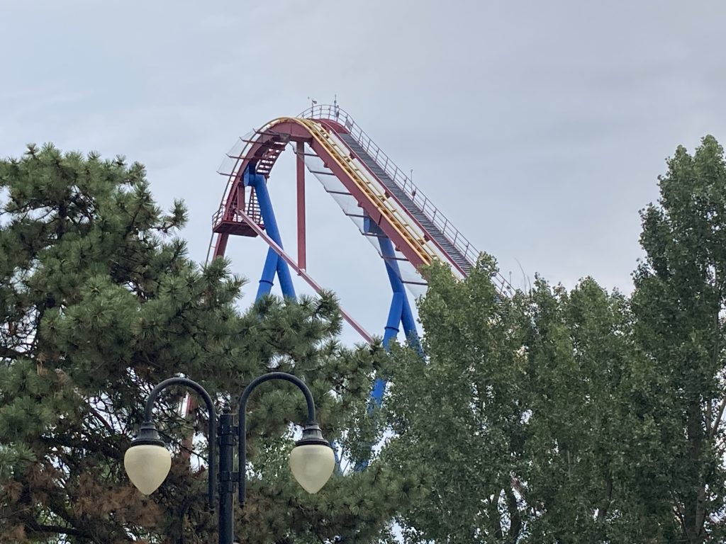 Goliath's lift hill peeking over the trees.
