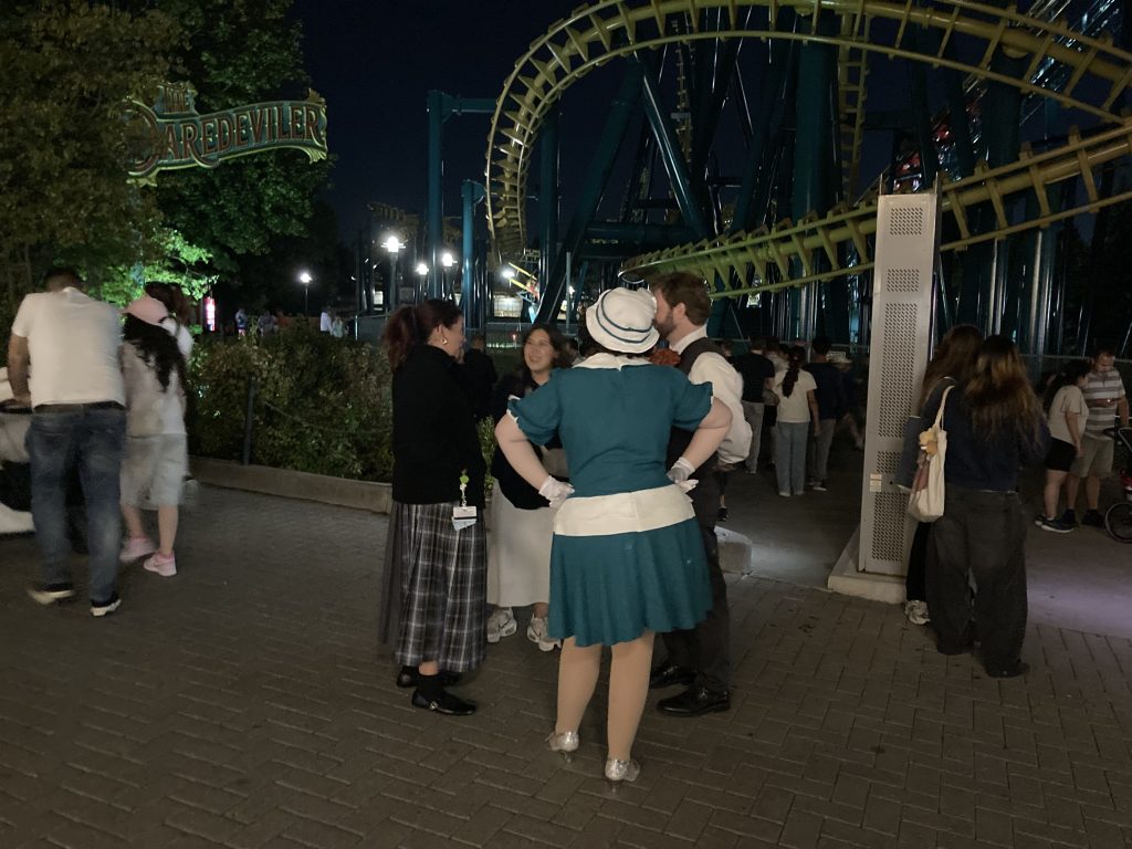 Vivienne and Etienne entertaining guests outside The DareDeviler.