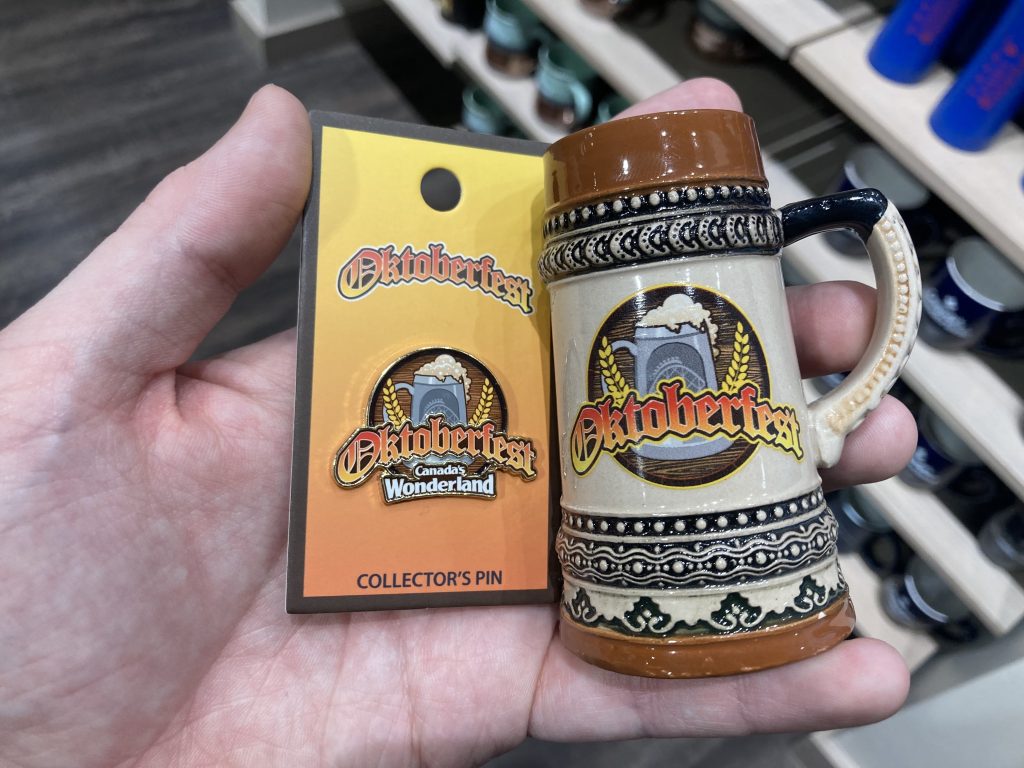 Oktoberfest pin and mini stein shot glass.